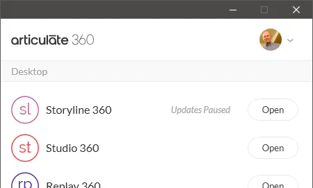 Interfaccia dell’app desktop Articulate 360 con Storyline 360 in stato Updates Paused e pulsanti Open visibili