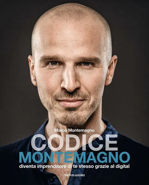 Primo piano di un uomo calvo con barba corta, copertina del libro Codice Montemagno con titolo e sottotitolo visibili