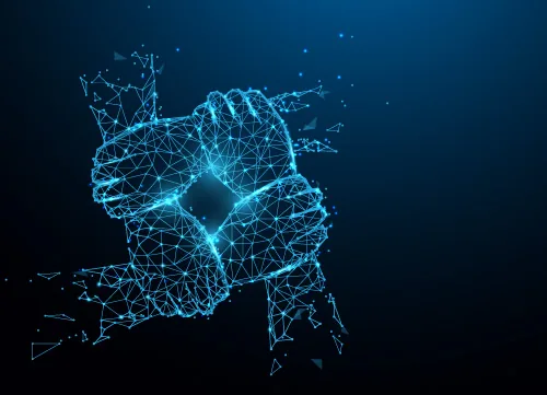 Rappresentazione digitale di quattro mani intrecciate che simboleggiano collaborazione e lavoro di squadra nell’e-learning