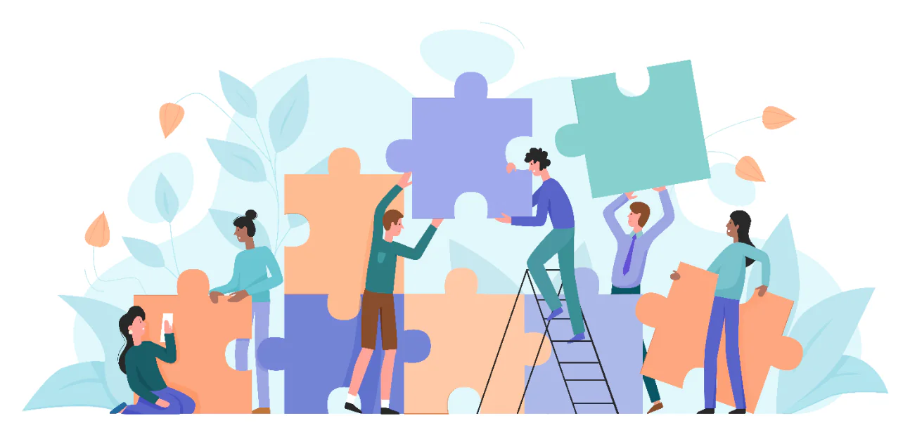 Persone che collaborano unendo grandi pezzi di puzzle, simbolo di lavoro di squadra nella progettazione eLearning