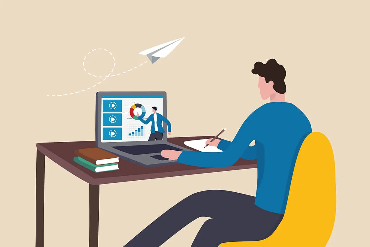 Persona segue una lezione online su laptop e prende appunti, simbolo di apprendimento integrato nel lavoro