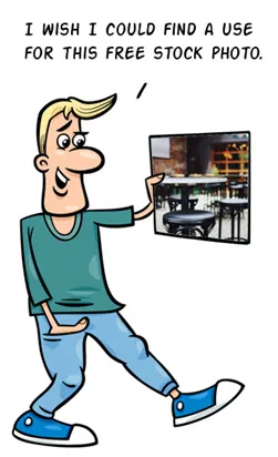 Personaggio cartoon tiene una foto stock di una classe vuota, riflettendo sull’uso di immagini gratuite nei corsi elearning