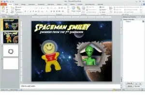 Schermata di PowerPoint con una slide che mostra un effetto grafico a buco nello spazio e personaggi cartoon