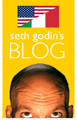 Parte superiore della testa calva sotto la scritta seth godin's blog con bandiere USA e Italia su sfondo giallo