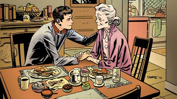 Peter Parker e zia May seduti a tavola si tengono per mano in un momento di empatia familiare